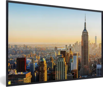 Produktbild von MuchoWow® Gerahmtes Poster Skyline von New York bei Sonnenuntergang mit dem Empire State Building 90x60 cm - Poster mit Schwarzem Bilderrahmen Wandposter Rahmen Foto Bilder - Fotorahmen - Foto-Plakat