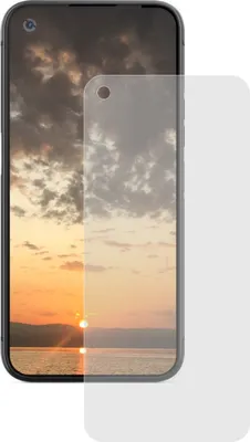 A screen protector is placed over a smartphone displaying a sunset.