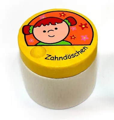 A close-up of a small wooden box with a cartoon drawing of a girl on the lid.