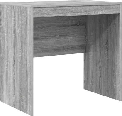 A simple, front-facing studio shot of a gray wooden desk against a white background.