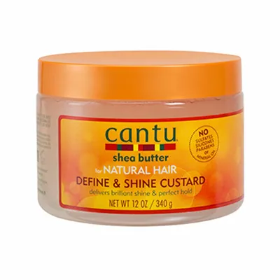 A jar of Cantu Shea Butter Define & Shine Custard for Natural Hair.