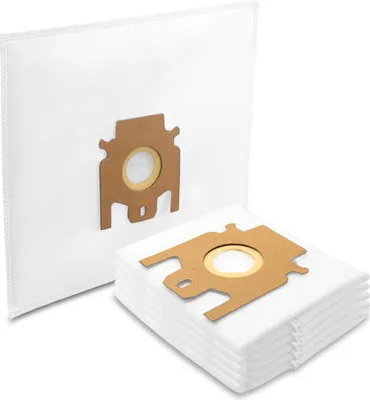 A stack of white vacuum cleaner bags with brown cardboard connectors, with one bag standing upright in the background.