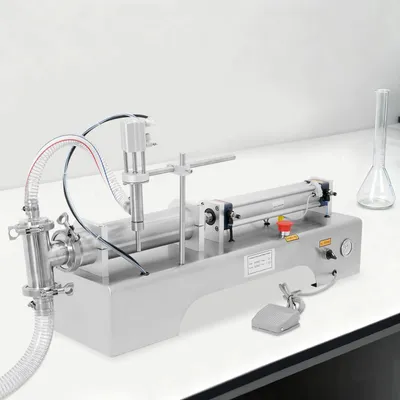 Obrázok produktu pre Plniaca stroj na tekutiny – Pneumatický – Automatický – Presnosť ±1 % – Pre vodu a tekutiny – Priemyselné použitie – Strieborný