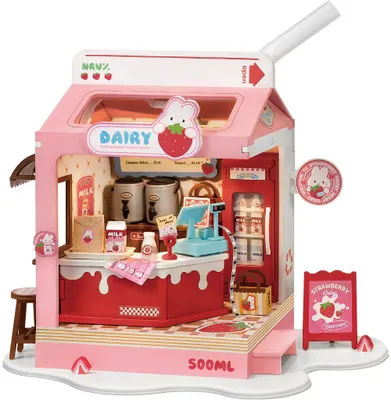 A miniature dollhouse resembling a strawberry dairy shop.