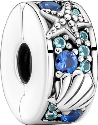 A close-up studio shot of a Pandora charm with a sea-themed design.