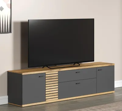 A modern TV lowboard with a television on top, set against a neutral background.