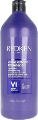 A full shot of a purple shampoo bottle.