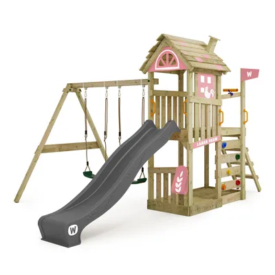 A wooden playground set with a slide, swings, and a small playhouse.