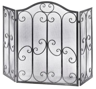 A three-panel metal fireplace screen with decorative scrollwork.