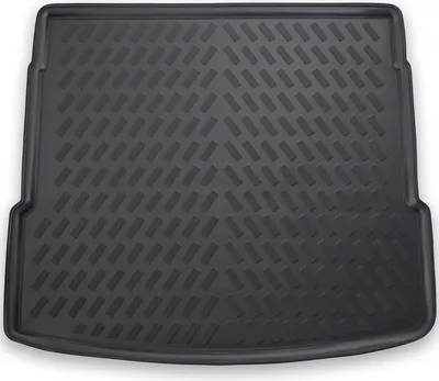 A black car trunk liner with a textured pattern.