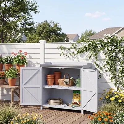 Imagen del producto de Armario de almacenamiento para jardín y herramientas, con superficie galvanizada y estante interior extraíble, mesa para herramientas de jardín, 98 x 47 x 94 cm, color gris
