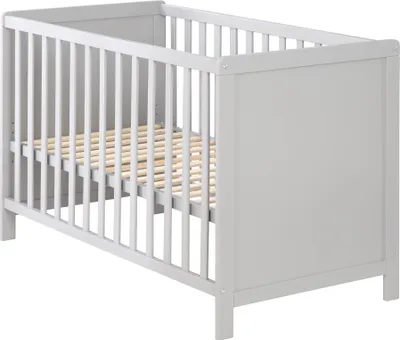 A light gray crib with a wooden slatted base is shown from a side angle against a white background.