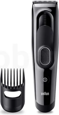 A black hair clipper and a comb attachment are displayed on a white background.