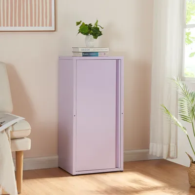 A lilac metal cabinet with sliding doors stands in a room with a chair and a plant.