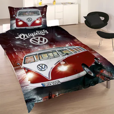 A bedding set featuring a Volkswagen campervan design, displayed on a bed in a bedroom setting.