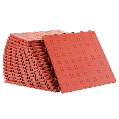 A stack of red interlocking garage floor tiles, with one tile prominently displayed in the foreground.