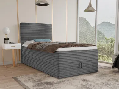 A bedroom scene with a single bed, nightstand, and a large window overlooking a mountainous landscape.