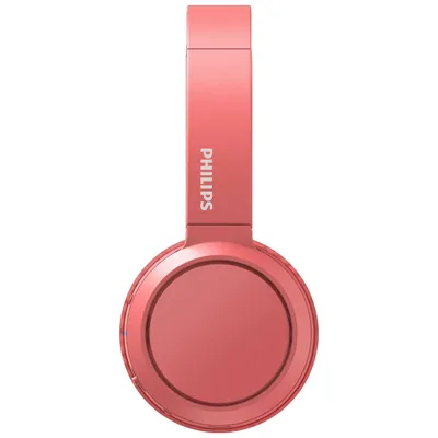 A close-up, studio shot of a single red headphone, viewed from the side.
