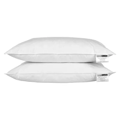 Two white pillows are stacked on top of each other against a white background.