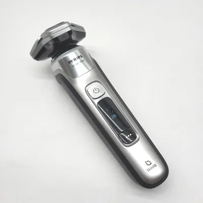Produktbild von Philips SHAVER Series 9000 S9975/54 Elektrischer Nass- und Trockenrasierer, Rotationstrasierer, Chrom, SkinIQ, GroomTribe, SH91, 2 Jahr(e)