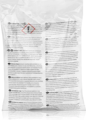 A clear plastic bag containing white granular product. The bag has multiple labels with text in various languages.