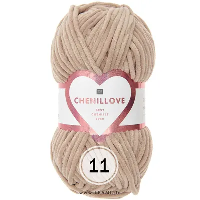 A ball of beige chenille yarn with a label.