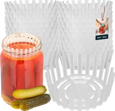 A jar of pickles and several pickles are shown in the foreground, with a stack of white plastic fermentation weights in the background.