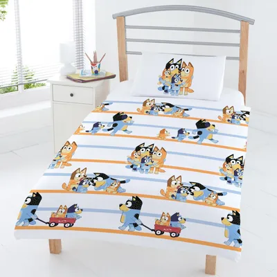 A Bluey-themed duvet cover and pillowcase set on a bed.