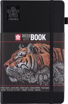 A black sketchbook with a tiger illustration on the cover.