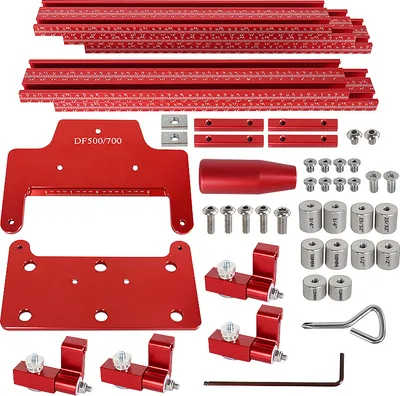 A collection of red aluminum woodworking tools and accessories, including guide rails, a handle, and various connectors and stops, laid out on a white background.