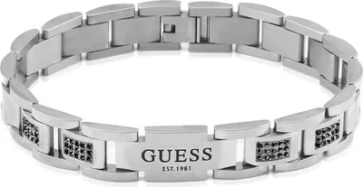 A silver-colored bracelet with black accents, featuring the Guess logo.