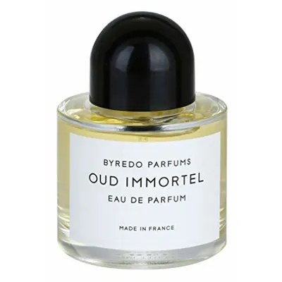 A clear, front-facing studio shot of a small bottle of Byredo Oud Immortel Eau de Parfum.