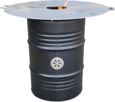 A black barrel-shaped grill with a large circular metal plate on top, featuring a central opening with flames visible.