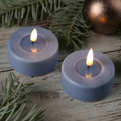 Produktbild von LED Maxi Teelichter MIA - Echtwachs - realistische 3D Flamme - D: 6,1cm - hellblau - 2 Stk.