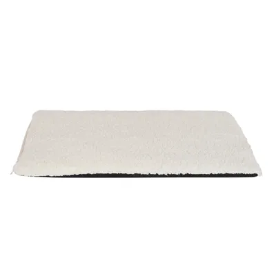 A white, textured pet blanket with a black underside, presented on a white background.