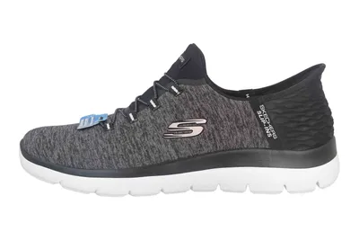 A side view of a black and gray Skechers sneaker.