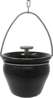 A black ceramic sauna pot with a metal handle and lid mechanism, suspended by a chain.
