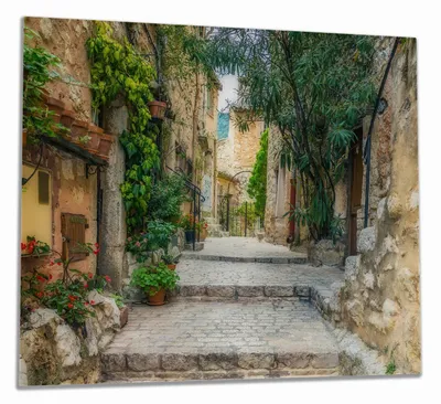 Produktbild von Wallario Herdabdeckplatte aus Glas, Größe 60 x 52 cm 1-teilig, Motiv Alte steinerne Gasse in Südfrankreich