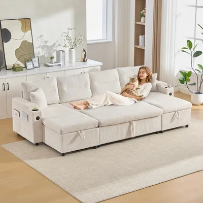 Produktbild von Moderner 4-Personen-Samtsofa mit beidseitigen Chaiselongues, integriertem Stauraum, Getränkehaltern, USB-Anschlüssen und ausziehbarer Schlaffunktion – stilvoll für jedes Wohnzimmer.Beige