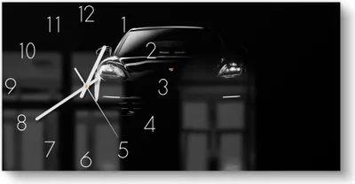 Produktbild von DEQORI Glasuhr 60x30 cm Zahlen 'Porsche Panamera Front' Wanduhr Glas Uhr Design leise
