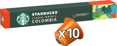 A box of Starbucks Single-Origin Colombia coffee capsules for Nespresso, with one capsule shown in the foreground.
