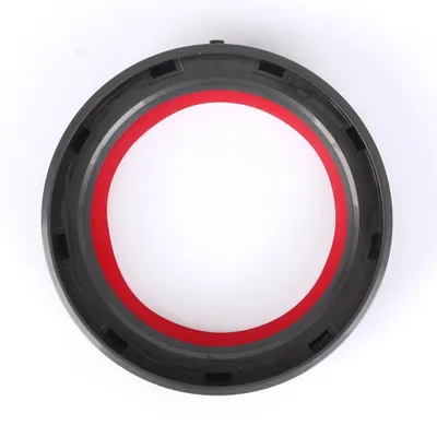 A top-down view of a black and red seal ring against a white background.