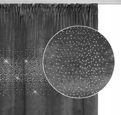 A close-up view of a gray velvet curtain with scattered sparkling crystals, showing the texture and detail of the embellishments.