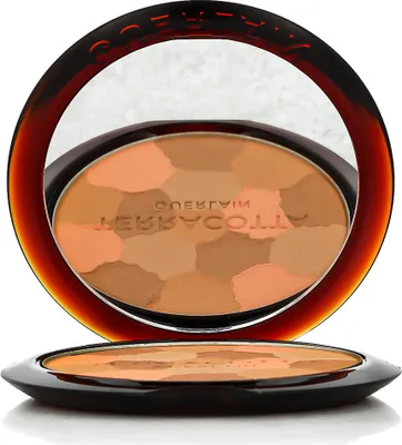 A bronzer compact with a mirror, showing the product inside and the compact itself.