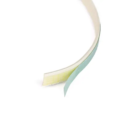 A close-up shot of a white and green sealing tape.
