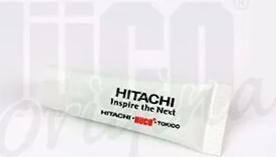 A tube of grease with branding and text.