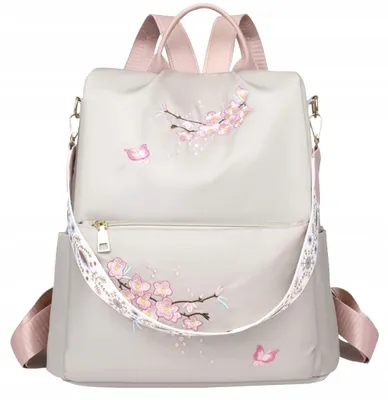 Produktbild von Damen Rucksack - Urbaner Chic - Stilvolle Vielseitigkeit - Sportliches Design - Organisierte Funktionalität - Geräumigkeit - Blumenmuster