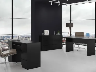 A modern office setting with black furniture and large windows overlooking a city.