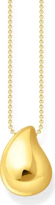 A gold pendant necklace with a teardrop-shaped charm.