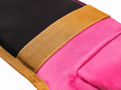 A close-up view of a fishing rod case, showing the texture and stitching of the fabric.